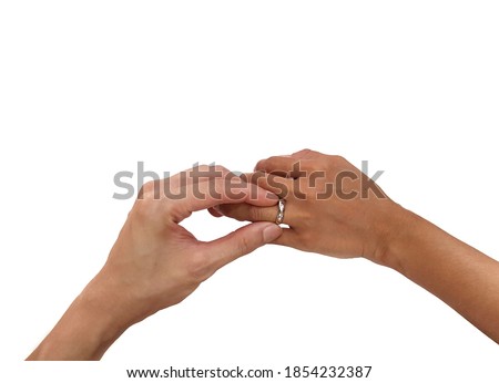 The picture of the finger is wearing the ring on the left ring finger on a white background.