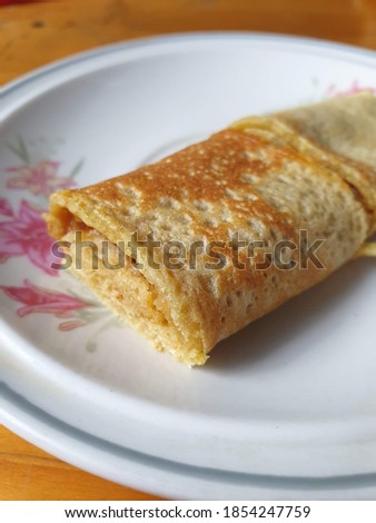Gluten free Pancake thinly pan fry and roll up 