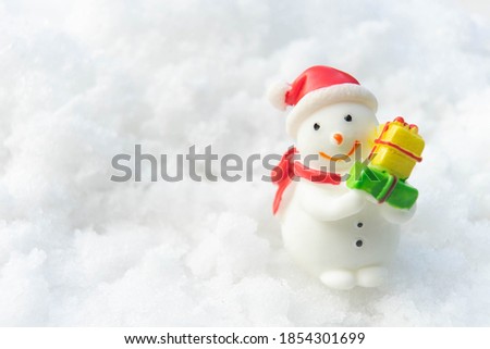 Snowman with snow Christmas and happy new year day