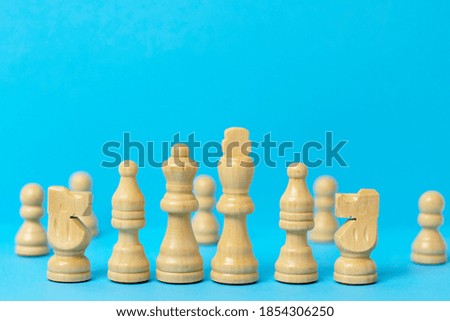 chess pieces on a blue background