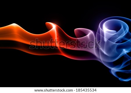 Smoke fire and ice on black background Royalty-Free Stock Photo #185435534