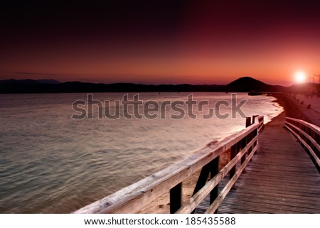 Amazing sunset on a beach Santona, Cantabria Royalty-Free Stock Photo #185435588
