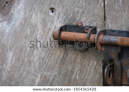 Photo of rusty door latch