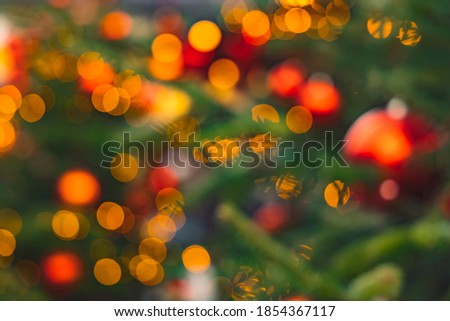 Christmas abstract picture yellow and orange lamps garland illumination lighting unfocused effect bokeh concept picture December winter holidays theme 