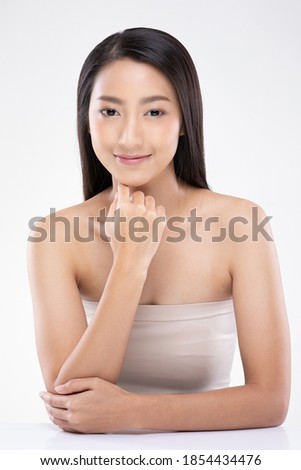 Beautiful Asian young woman touching chin smile with clean and fresh skin Happiness and cheerful with positive emotional,isolated on white background,Beauty Cosmetics and spa Facial treatment Concept