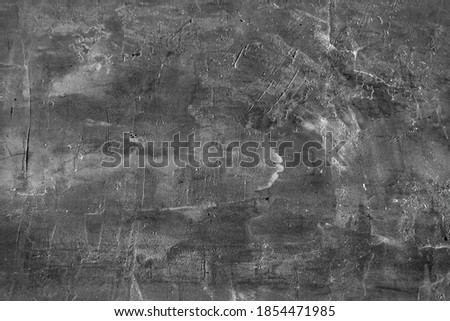 Dark black concrete texture wall. Plaster grey texture background. Black concrete chalkboard.