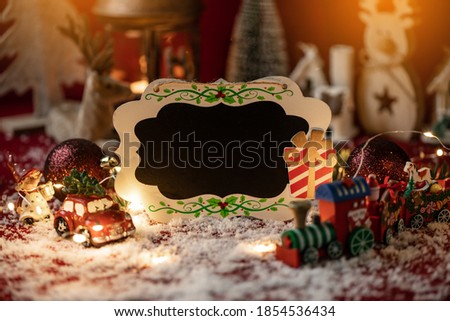 Christmas bord with copy space surrounded with christmas decorations. Christmas concept.