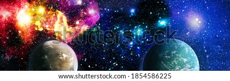 Spiral galaxy in deep space. Stars of a planet and galaxy in a free space. Colored nebula and open cluster of stars in the universe. Elements of this image furnished by NASA.