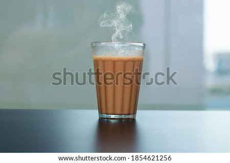 Fresh milk tea or Indian Kadak Chai. Royalty-Free Stock Photo #1854621256