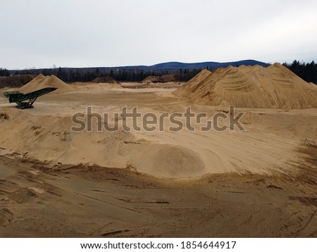 a bird's-eye view of an open-air sand pit