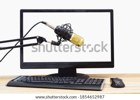 Microphone against the background of computer controls