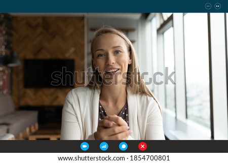 Computer application head shot display view smiling young blonde 30s woman talking looking at web camera, successful businesswoman holding online video call negotiations meeting with partners. Royalty-Free Stock Photo #1854700801