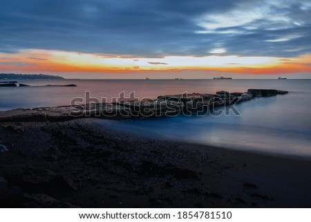 One beautifyl part of Varna town beach located in Bulgaria. Sunrise longexposure pictures always deliver the most beautiful effect when the photography catches the movement of the nature.