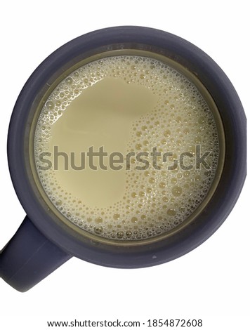 Hot tofu juice in glass on a white background