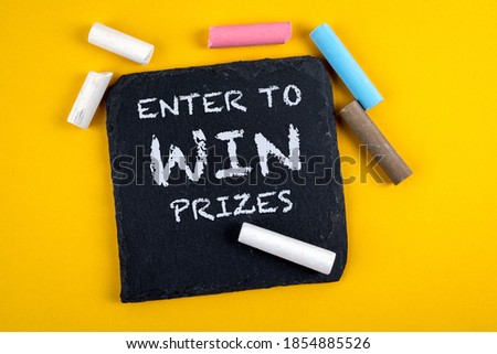 Enter to win prizes. Text on a stone surface. Banner for business, marketing and advertising