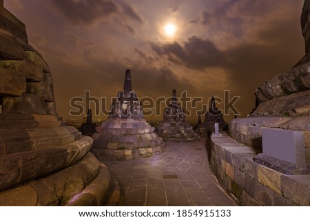 Borobudur Buddist Temple in island Java Indonesia - travel and architecture background