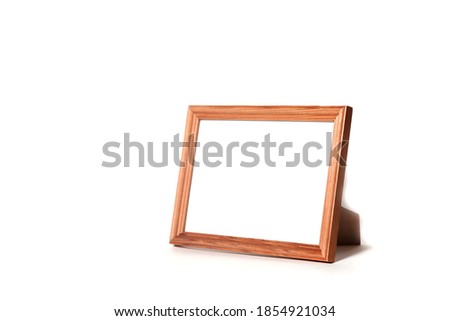 Empty wooden text frame isolated on white background with cropped path. Layout of an image or poster on wall. Clean, modern, minimal frames, show logo or product. Concept stylish site. Copy space