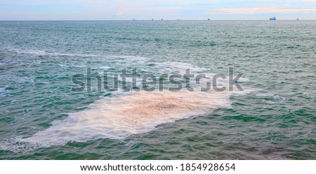 Bilge pollution on the surface of the sea Royalty-Free Stock Photo #1854928654
