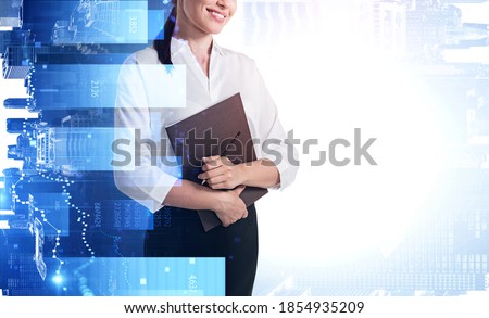 Unrecognizable businesswoman standing with folder in blurry city with double exposure of financial graphs. Toned image