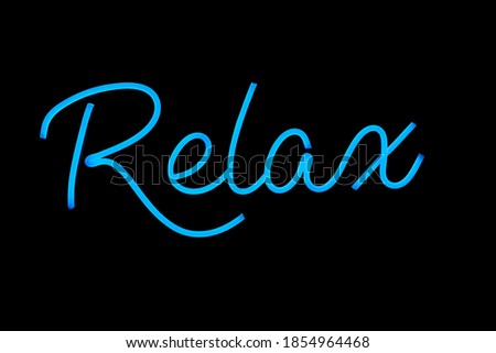 Neon sign relax on isolated black background.  Neon concept. Modern style. Neon sign.