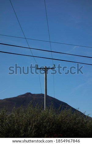 energy supply with a low voltage power line and power pole