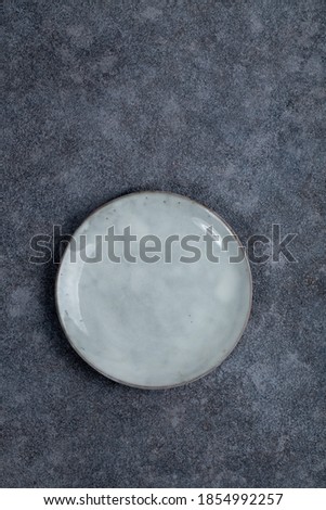 Vintage Rustic Plate on beautiful Stone textured background. Minimalist Style. Template for Poster Banner Cooking Baking Workshop Course