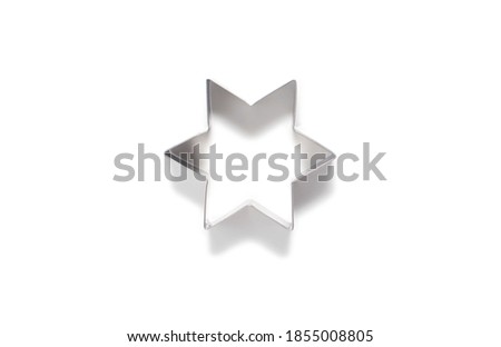 cookie cutters for homemade Christmas festive cookies isolated on a white background.