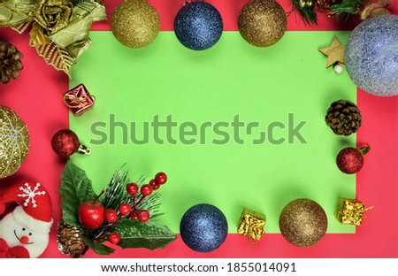 Merry Christmas. Two-color background with a variety of Christmas decorations. Space in the center for text or idea.