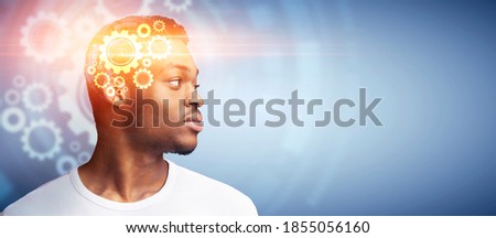Collage of serious black guy with gears in his head thinking and looking at empty space over blue background. African American man pondering over innovative idea, searching for inspiration Royalty-Free Stock Photo #1855056160