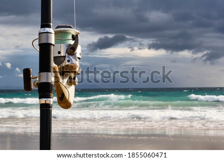photography of a fishing rod