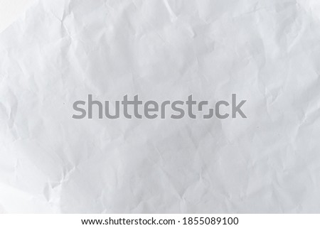 White crumpled paper texture. Abstract paper pattern for background. Close-up image.
