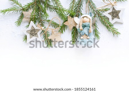 Christmas tree decoration on the white background with snow