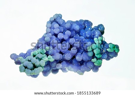 Natural stone-chalcedony Spherulites (grape chalcedony) on a white background. Natural mineral gemstone. Closeup. Royalty-Free Stock Photo #1855133689