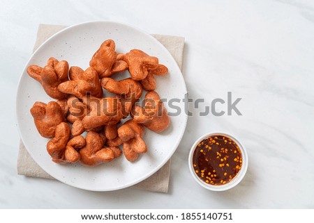 deep fried sausage with dipping sauce