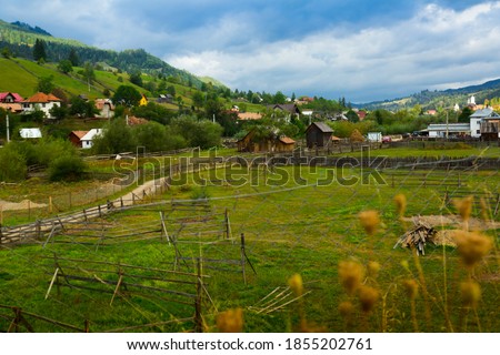 Illustration of old Sadova village in Karpaty on Bucovina in Romania.