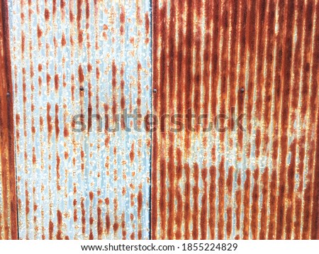 Rust zinc fence, roof and wall abstract texture background, surface from old backdrop.