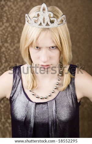 Angry young girl in a tiara