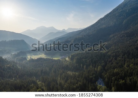 Drone panorama over forest and mountains in Bavaria, Germany . Royalty-Free Stock Photo #1855274308