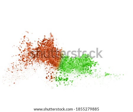Abstract multicolored powder splash on white background.Freeze motion of color powder exploding.