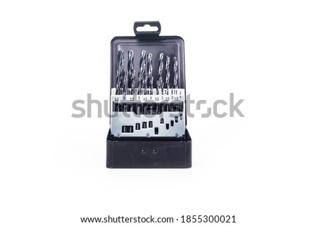 Studio lighting. in a metal case there are several pieces of dark color. Set. Close-up