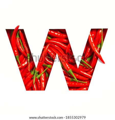 Letter W of English alphabet of hot red chili pepper and cut paper isolated on white. Font, typeface of spicy vegetables