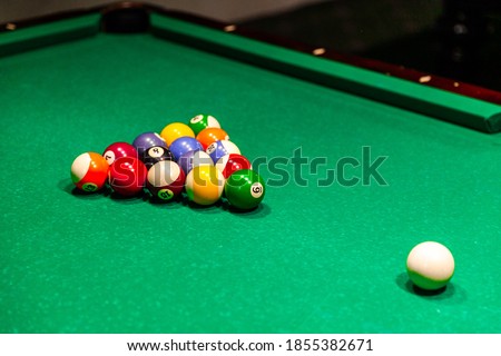 billiard table with colored balls