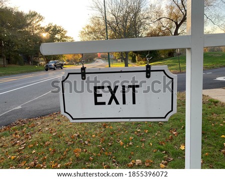 A sign of exit in black and white