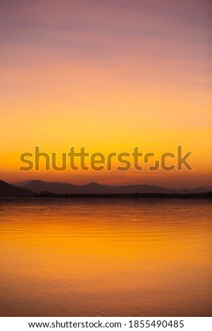 Twilight orange sky Beautiful water reflection