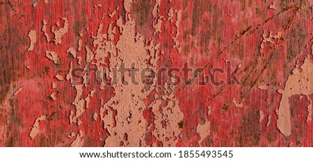 Surface for the backdrop. Old multi-layer paint. Color - red, orange, sand. Cracks, peeling, scratches.