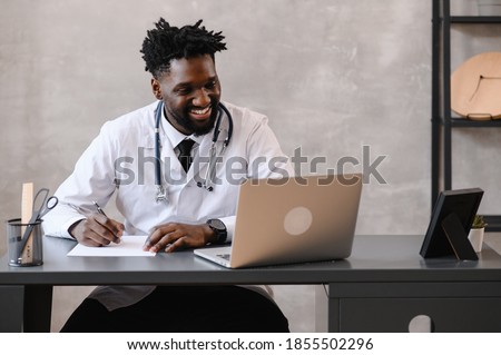 telehealth with virtual doctor appointment and online therapy session. Black doctor online conference  Royalty-Free Stock Photo #1855502296