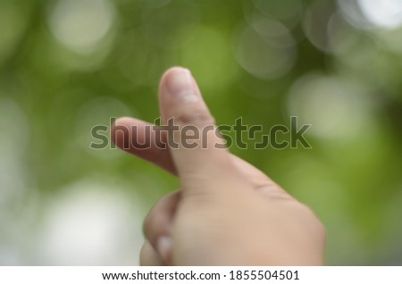 Blur background of female fingers