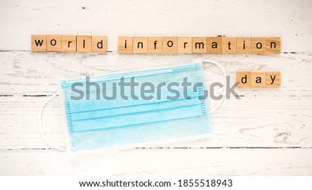 World Information Day.words from wooden cubes with letters photo