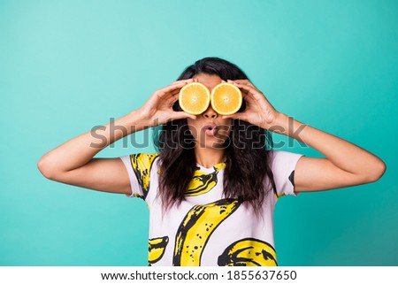 Photo of astonished dark skin girl cover eyes orange wear pink t-shirt isolated over turquoise color background