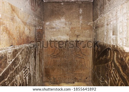 Bas-reliefs of the secret room (сrypt) in the temple of Hathor at Dendera, Egypt